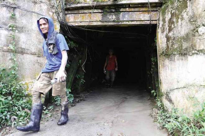 A MINER emerges from a tunnel in T’boli, South Cotabato province. Jeoffrey Maitem