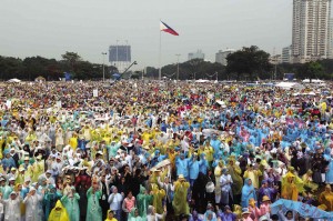 FOR LOVE OF FRANCIS  Oblivious of pelting rain brought by Tropical Storm “Amang,” millions of Filipinos hear Mass celebrated by Pope Francis at Rizal Park on Sunday at the conclusion of his four-day apostolic visit to the Philippines. Authorities estimated the crowd at 6 million to 7 million, surpassing the 5 million attracted by St. John Paul II’s final Mass for World Youth Day celebrations at the same venue in January 1995. JOAN BONDOC
