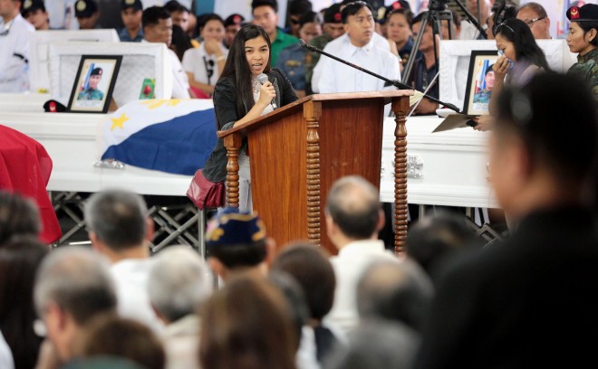 Erica Pabalinas, widow of one of the Special Action Forces (SAF) commandos who perished in the Mamasapano, Maguindanao incident delivers her emotional response during the necrological services at Camp Bagong Diwa in Taguig City on Friday. GRIG C. MONTEGRANDE/INQUIRER