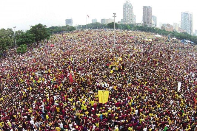 AS FAR AS THE EYES CAN SEETens of thousands of devotees crowd the Black Nazarene as the revered image is borne through the center of Manila from Rizal Park. It is the faithful’s unshakable belief that joining the procession will shower blessings on them and that all their prayers will be answered. Photographed from the Inquirer’s camera drone by Rem Zamora.  