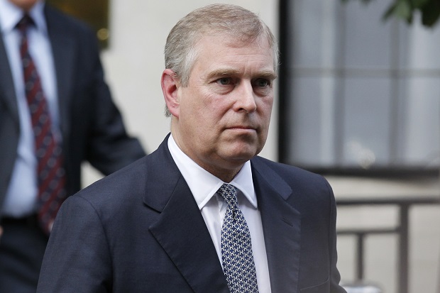 FILE- In this Wednesday, June 6, 2012 file photo, Britain's Prince Andrew leaves King Edward VII hospital in London after visiting his father Prince Philip. Reacting to U.S. court documents, royal officials issued a statement on Friday, Jan. 2, 2015 denying that Britain's Prince Andrew engaged in sexual impropriety with a minor.  AP