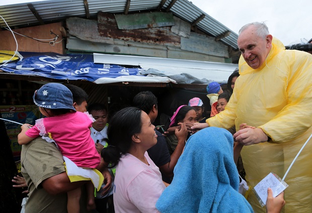 Pope Francis visits families of typhoon Yolanda victims in one of the areas in Palo, Leyte Saturday, January 17, 2015.  (Photo by Benhur Arcayan/Malacanang Photo Bureau)