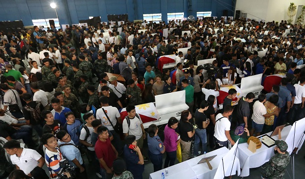 SAF 44/ JAN 30,2015 The 42 bodies of the SAF 44 inside the Camp[Agong Diwa multi purpose hall INQUIRER PHOTO/JOAN BONDOC