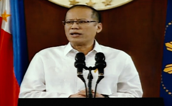 President Benigno Aquino III delivers his message to the nation on the Mamasapano incident in a televised address Wednesday night. Screengrab from RTVM livestream