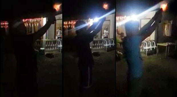 CaptioN: Screengrabs from a video made public on Facebook show three men firing guns during the New Year's Day revelry.