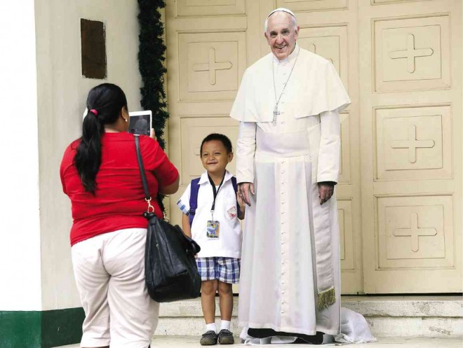 CHURCHES nationwide, like this one in the province of Cebu, have placed cardboard images of Pope Francis for people to take selfies with in the hope of preventing people from rushing the Pope for selfies during his visit. CEBU DAILY NEWS