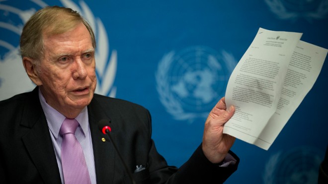 Retired Australian judge Michael Kirby, chairperson of the commission of Inquiry on Human Rights in the Democratic People’s Republic of Korea, shows a UN letter to North Korean leader warning on-accountability for crimes during a press conference at the United Nations in Geneva, Switzerland, Monday, Feb. 17, 2014. A U.N. panel has warned North Korean leader Kim Jong Un that he may be held accountable for orchestrating widespread crimes against civilians in the secretive Asian nation. AP