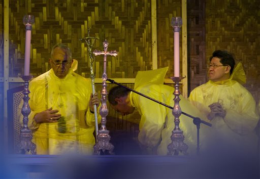 Pope Francis, left, celebrates a mass in Tacloban, Philippines, Saturday, Jan. 17, 2015.  AP