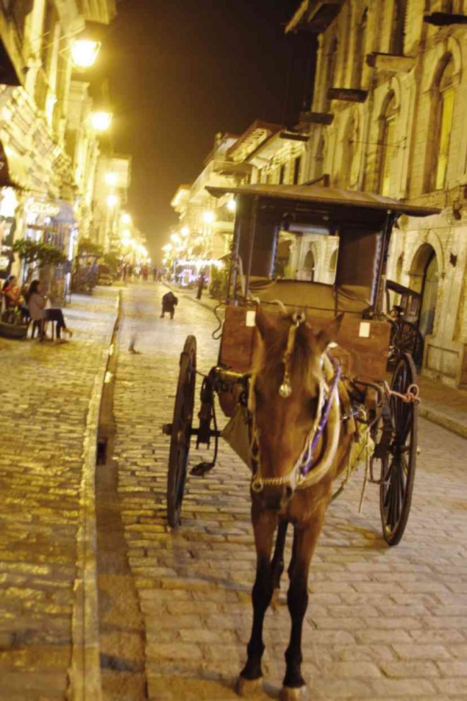 NEW WONDER One of Vigan City’s more renowned streets, Calle Crisologo, beckons tourists. LEONCIO BALBIN JR/INQUIRER NORTHERN LUZON