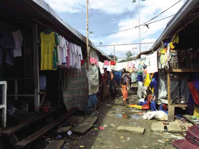 BUNKHOUSES, now dilapidated, were built for Zamboanga City residents but have turned into breeding grounds for prostitution and sexually transmitted diseases. JULIE ALIPALA 