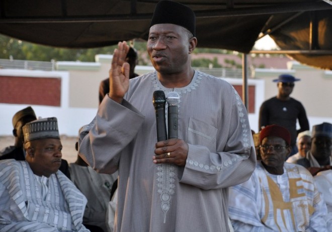 President Goodluck Jonathan speaks to displaced people from Baga in a Maiduguri camp on Jan. 15. AFP