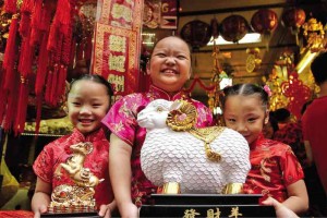 NOT-SO-SHEEPISH The Tsinoy girls of Binondo welcome the Chinese New Year on Thursday. RICHARD A. REYES