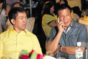 Davao City Mayor Rodrigo Duterte (right) MARIANNE BERMUDEZ PHOTO