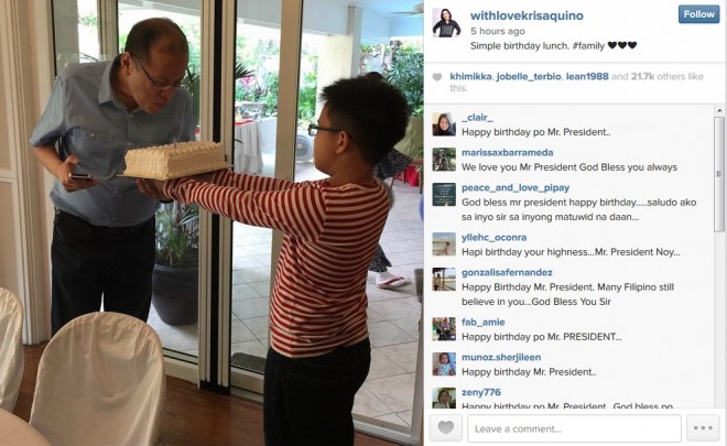 President Aquino blows the candle on his birthday cake held by his nephew, Bimby Aquino-Yap. Screencap of Kris Aquino's Instagram post.