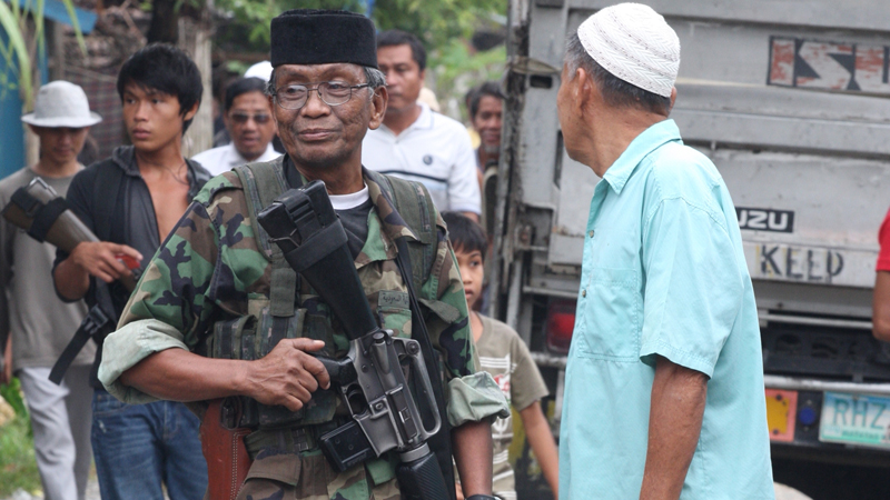 In this picture shows Abu Misri Mama (left), the spokesman of Bangsamoro Islamic Freedom Fighters, at their camp in Datu Saudi Ampatuan town in Maguindanao.  PHOTO BY JEOFFREY MAITEM / INQUIRER MINDANAO