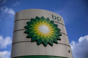 A BP logo is seen outside a petrol station in the town of Bletchley in Buckinghamshire, England, Thursday, Jan. 15, 2015.  BP has announced it will cut an estimated 200 staff jobs and another 100 contracting jobs in light of falling oil prices.  The company said Thursday the cuts will be made in onshore roles, not in offshore operational positions. Regional president Trevor Garlick said BP remains committed to its North Sea operations but needs to take "specific steps" given the challenging economic environment.  (AP Photo/Matt Dunham)