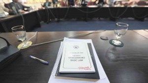   A draft of the Bangsamoro Basic Law lies unread on a table in the House of Representatives after the congressional inquiry on the death of 44 police commandos seems to take precedence; the BBL is tabled in the meantime.  LYN RILLON/INQUIRER FILE PHOTO