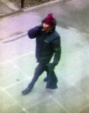 In this photo dated Saturday Feb. 14, 2015, issued by Copenhagen Police believed to show the suspect in a shooting at a freedom of speech event in Copenhagen, in a photo taken from a street camera near to where the getaway car was later found dumped.  In what is seen as a likely terror attack against a free speech event organized by an artist who had caricatured the Prophet Muhammad, the police believe there was only one shooter in the attack on a Copenhagen cafe that left one person dead and three police officers wounded.  (AP Photo /Copenhagen Police) DENMARK OUT - NO SALES