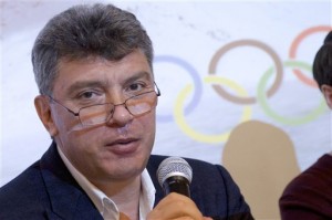  In this file photo taken on Thursday, May 30, 2013, Boris Nemtsov, a former Russian deputy prime minister and opposition leader, presents a report claiming widespread corruption during preparations for the 2014 Winter Games in Sochi, at a news conference in Moscow, Russia.  AP PHOTO/IVAN SEKRETAREV 