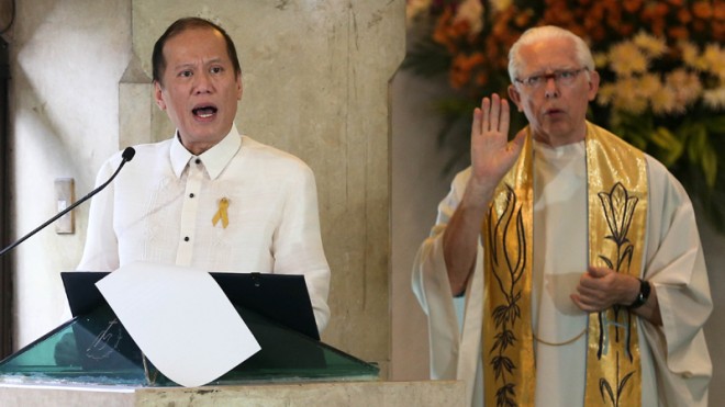 President Benigno S. Aquino III delivers his speech at the Edsa Shrine during the 29th anniversary of the EDSA People Power Revolution on Wednesday. Acting as interpreter using sign language is Fr. Luke Moortgat. LYN RILLON