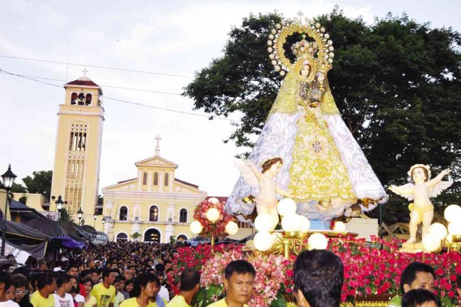 THE  MANAOAG shrine at the backdrop of a procession of the image of the Our Lady of the Rosary of Manaoag WILLIE LOMIBAO/ CONTRIBUTOR