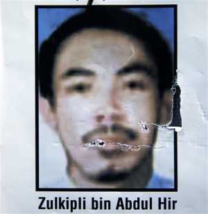 This undated file photo from a Philippine National Police wanted poster shows Zulkipli bin Abdul Hir, a Malaysian national and one of the most wanted terrorists in Southeast Asia, also known as Marwan, who is the object of a manhunt by elite police commandos but was in turn killed by Muslim guerrillas Sunday, Jan. 25, 2015 in Maguindanao province in southern Philippines. Philippine officials have removed the commander of a police special action force from his post after at least 44 anti-terror commandos were killed in a clash with Muslim rebels in the province. (AP Photo)