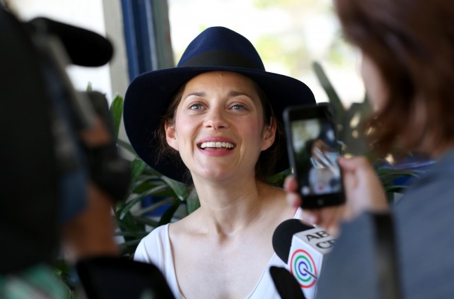 French Actress Marion Cottilard is warmly greeted by the French Community in Better Living Paranaque City, during her 2 day visit in the country with French President Francois Hollande. INQUIRER/ MARIANNE BERMUDEZ