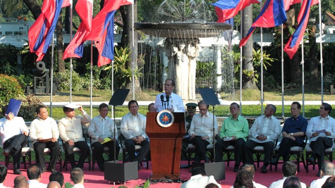 President Aquino delivers his message during a prayer gathering at the Malacañan Palace grounds on Monday. He again defended himself against public outrage over his refusal to take responsibility for the Mamasapano clash, saying the police counterterrorism operation would have had a different outcome had the ground commander followed his instructions to coordinate with the military.  PHOTO BY GIL NARTEA/MALACAÑANG PHOTO BUREAU