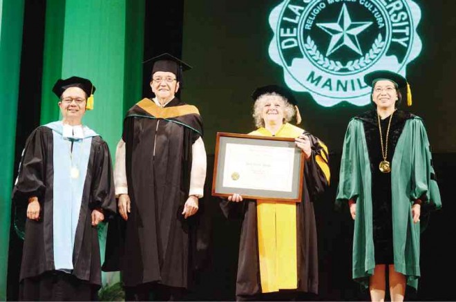 DLSU’s  Suplido, board of trustees chair Jose Pardo and vice chancellor for academics Myrna Austria confer an honorary doctorate in Science on Yonath. Photos courtesy of DLSU