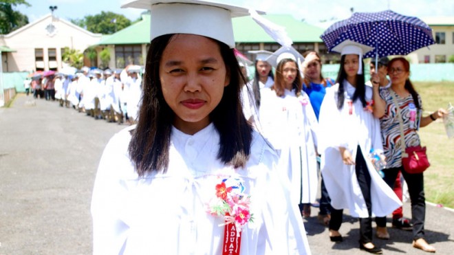 OPEN HIGH SCHOOL PROGRAM Working full-time as house help did not stop Rodora Rodriguez, 27, from earning a high school diploma, graduating at the top of her class at QuezonNational High School in Lucena City. ARNOLD ALMACEN