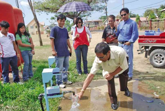 INSERT an ATM card, water will flow. This is the barangay water system of Sison, Pangasinan province. CONTRIBUTED PHOTO