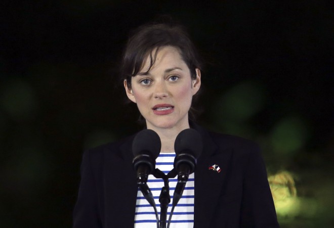 French award-winning actress Marion Cotillard speaks during the Launch of Manila Call To Action On Climate Change, at the Malacanang Presidential Palace, in Manila, Philippines, Thursday, Feb. 26, 2015. Cotillard is in the country with French President Francois Hollande on a two-day visit. AP