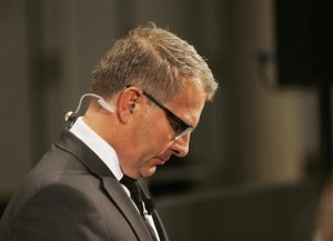 CEO of German Lufthansa airline Carsten Spohr waits to talk to the media in Frankfurt, Germany, Tuesday March 24, 2015, after returning from the crash site of a Germanwings passenger jet. The jet was carrying at least 150 people and crashed in a snowy, remote section of the French Alps, sounding like an avalanche as it scattered pulverized debris across the mountain. (AP Photo/Michael Probst)