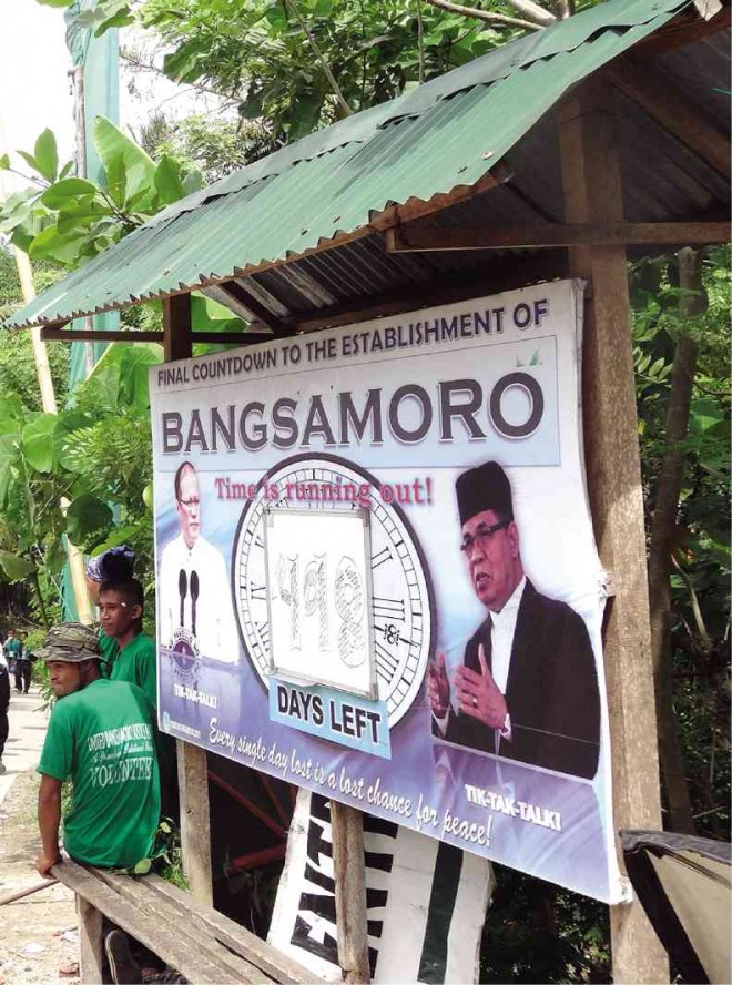 INSIDE Camp Darapanan, the main Moro Islamic Liberation Front (MILF) camp, billboards like this one are conspicuously hung to remind members of MILF and their families about the Bangsamoro Basic Law. The camp will be the venue today of a mass registration of MILF members as voters to be held by the Commission on Elections. NASH B. MAULANA/INQUIRER MINDANAO 