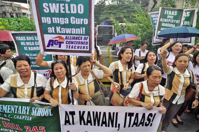 TEACHERS picket at the Mendiola Peace Arch in Manila in October last year calling for the suspension of the implementation of the K-to-12 education reform program that its critics said would bring more hardships to teachers, parents and students.RICHARD A. REYES