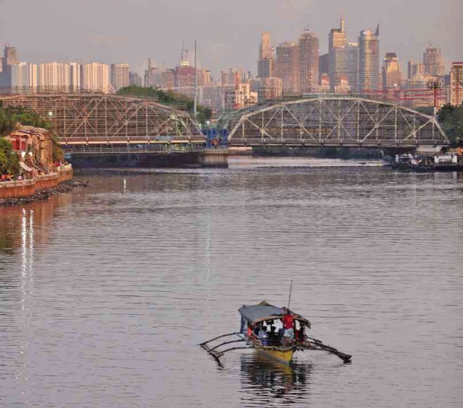 SLIGHT RAISE, HEAVY JOB  As part of its P448-million upgrade, the span over Pasig River which connects Manila’s Ermita and San Miguel districts  is being raised by 70 centimeters.NIÑO JESUS ORBETA
