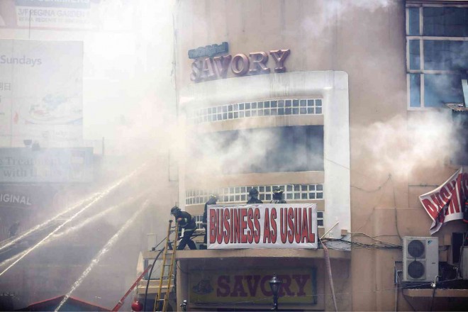 BELOVED RESTO BURNS  Diners of a popular restaurant in Manila will miss its famous fried chicken special after a fire razed the establishment Thursday morning. Responding firemen failed to contain the three-hour blaze that razed Savory restaurant, a familiar landmark on historic Escolta street.  JOAN BONDOC 