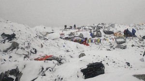 This photo provided by Azim Afif shows the scene after an avalanche triggered by a massive earthquake swept across Everest Base Camp, Nepal on Saturday, April 25, 2015. Afif and his team of four others from the Universiti Teknologi Malaysia (UTM) all survived the avalanche. (Azim Afif via AP)