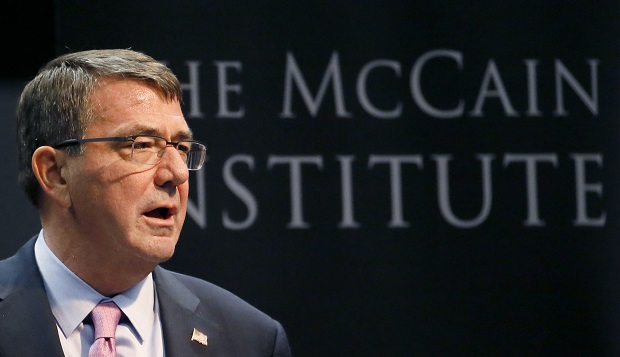 U.S. Secretary of Defense Ash Carter speaks, Monday, April 6, 2015, at the the McCain Institute at Arizona State University in Tempe, Ariz.  The Obama administration is opening a new phase of its strategic "rebalance" toward Asia and the Pacific by investing in high-end weapons such as a new long-range stealth bomber, refreshing its defense alliance with Japan and expanding trade partnerships, Carter said Monday.  (AP Photo/Matt York)