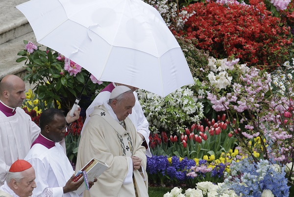 Pope Francis celebrates an Easter mass, in St. Peter's square at the Vatican, Sunday, April 5, 2015. AP