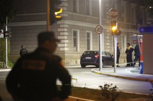 Police officers secure an area near to a police station in eastern Bosnian town of Zvornik, 200 Km (124 miles) east of Sarajevo, on Monday, April 27, 2015. Bosnian authorities say a man stormed into a police station in a northeastern town of Zvornik shouting "Allahu akbar," killing a policeman and wounding two others, according to Police spokeswoman Aleksandra Simojlovic, who confirmed to The Associated Press that the attacker was killed. AP