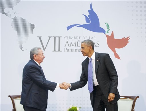 US President Barack Obama and Cuban President Raul Castro shake hands at the Summit of the Americas in Panama City, Panama, Saturday, April 11, 2015. AP 