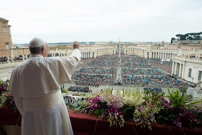 Pope Francis delivers the Urbi et Orbi (to the city and to the world) blessing at the end of the Easter Sunday Mass in St. Peter's Square at the Vatican , Sunday, April 5, 2015.  In an Easter peace wish, Pope Francis on Sunday praised the framework nuclear agreement with Iran as an opportunity to make the world safer, while expressing deep worry about bloodshed in Libya, Yemen, Syria, Iraq, Nigeria and elsewhere in Africa. Cautious hope ran through Francis' "Urbi et Orbi" Easter message, a kind of papal commentary on the state of the world's affairs, which he delivered from the central balcony of St. Peter's Square. AP