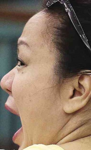 WHEELER-DEALER. Janet Lim-Napoles, accused mastermind of the pork barrel scam, yawns during a hearing on her bail petition at the Sandiganbayan. RAFFY LERMA 