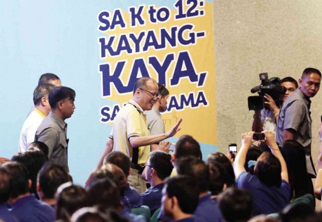 ALL SET  President Aquino waves to the crowd at the Philippine International Convention Center where he  told a Department of Education gathering that the country is now ready for the start of the government’s K to 12 education reform program. GRIG C. MONTEGRANDE