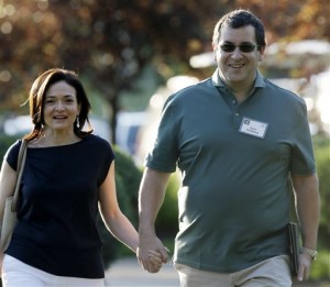 In this July 10, 2013 file photo, Sheryl Sandberg, COO of Facebook, left, and her husband David Goldberg, CEO of SurveyMonkey, walk to the morning session at the Allen & Company Sun Valley Conference in Sun Valley, Idaho. Goldberg was exercising at a gym in a Mexican resort when he collapsed before he died Friday, May 1, 2015, a person close to the family says. AP
