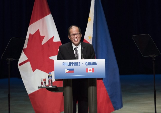 Benigno Aquino III, President of the Philippines, speaks during an event at Roy Thompson Hall with Canadian Prime Minister Stephen Harper in Toronto on Friday, May 8, 2015. (Aaron Vincent Elkaim/The Canadian Press via AP)