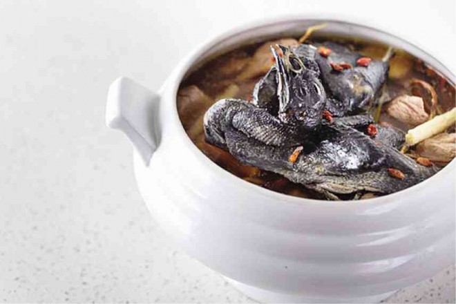 BLACK Chicken with Ginseng Soup is a herbal soup that is cooked for four hours. It is available in an upscale Chinese restaurant in Cebu City. BOBOI COSTAS/CONTRIBUTOR 