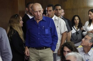 This May 13, 2014, file photo shows Israel's former Prime Minister Ehud Olmert at the Tel Aviv District Court in Israel. AP Photo