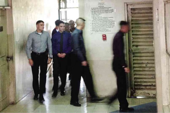 OLONGAPO TRIAL  US Marine Lance Cpl. Joseph Scott Pemberton (second from left), who is accused of killing transgender woman Jeffrey “Jennifer” Laude, arrives at the Olongapo City Hall for Tuesday’s hearing. ERWIN AGUILLON/RADYO INQUIRER 